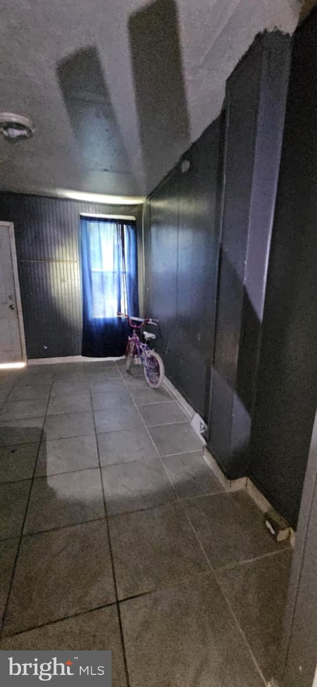 67 Vine St, Trenton, NJ 08638 - corridor featuring tile patterned flooring