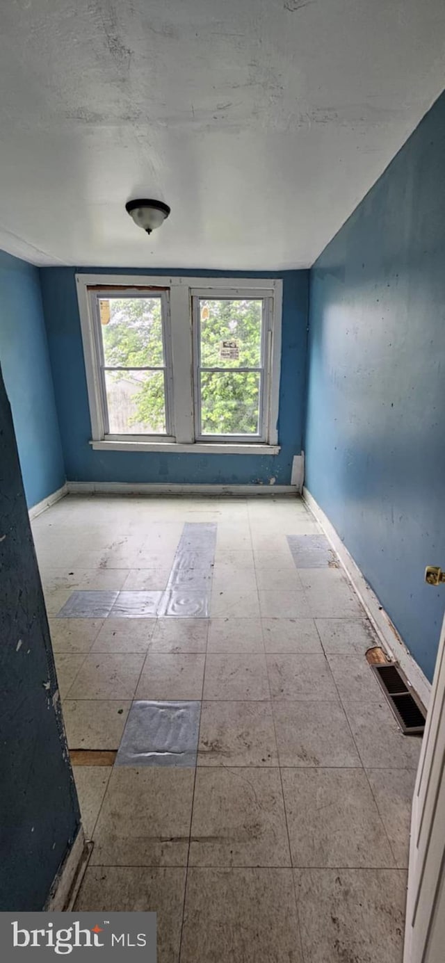 67 Vine St, Trenton, NJ 08638 - empty room featuring healthy amount of natural light