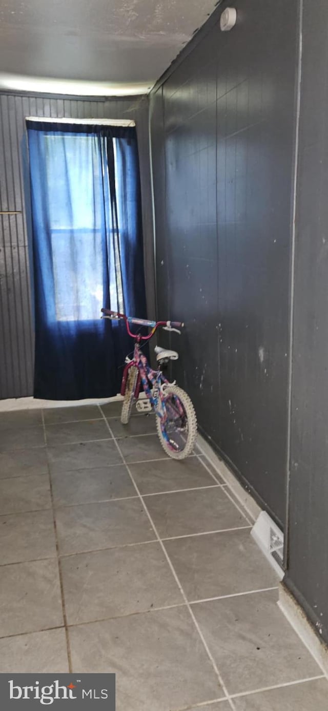 67 Vine St, Trenton, NJ 08638 - empty room with tile patterned floors