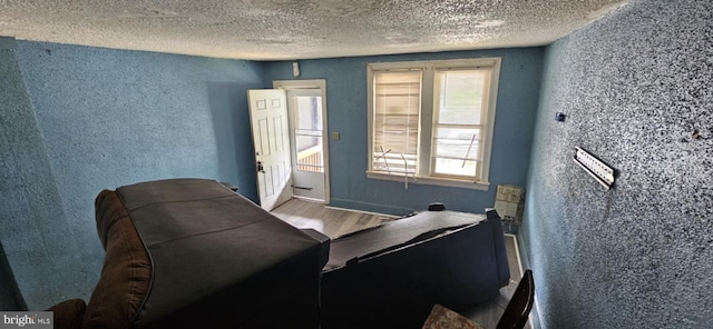 67 Vine St, Trenton, NJ 08638 - living area with a textured wall, a textured ceiling, and wood finished floors