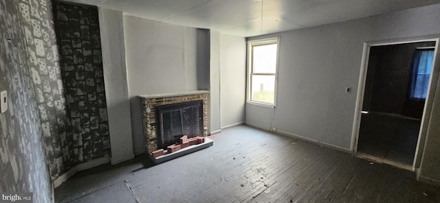 67 Vine St, Trenton, NJ 08638 - unfurnished living room with a fireplace and hardwood / wood-style floors