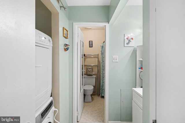 825 N 29th St Unit 5G, Philadelphia, PA 19130 - bathroom with vanity, tile patterned floors, a shower with curtain, and washer / dryer