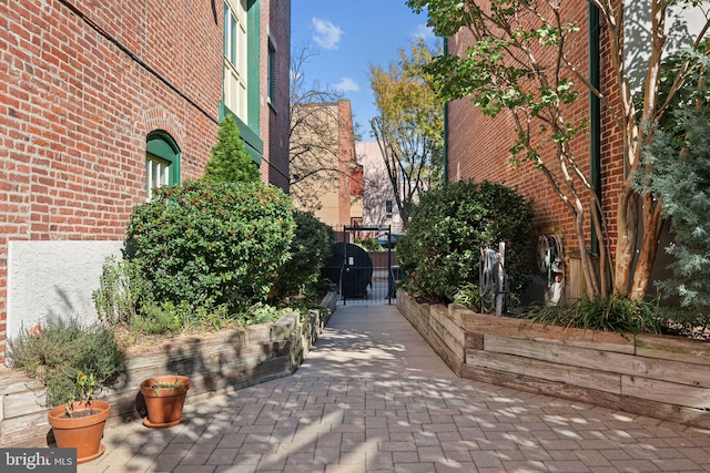 825 N 29th St Unit 5G, Philadelphia, PA 19130 - view of home's exterior with a gate and brick siding