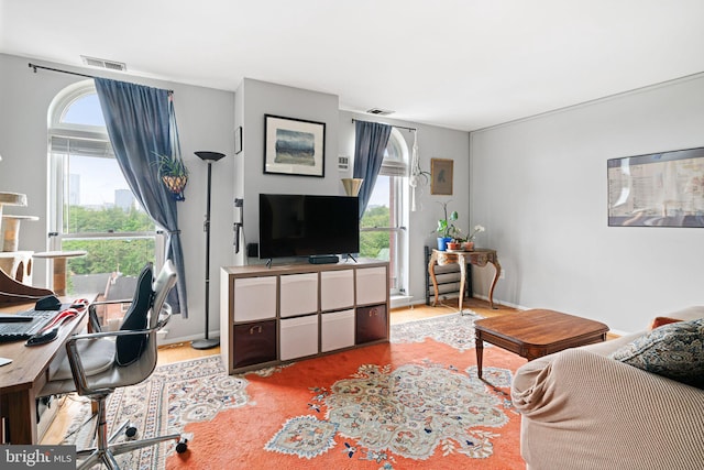 825 N 29th St Unit 5G, Philadelphia, PA 19130 - living area with healthy amount of natural light and wood finished floors