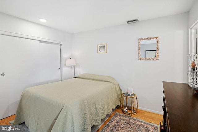 825 N 29th St Unit 5G, Philadelphia, PA 19130 - bedroom with wood finished floors, a closet, and recessed lighting