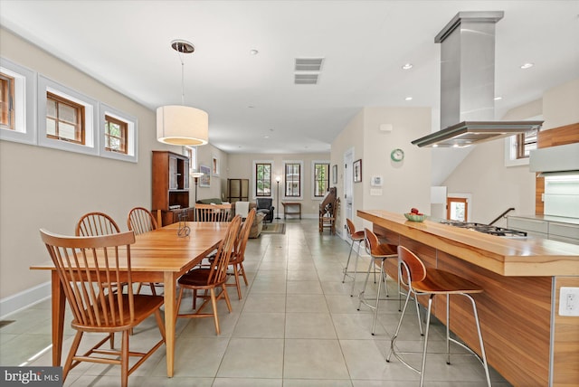 9 E Walnut St, Alexandria, VA 22301 - dining space with recessed lighting and light tile patterned floors