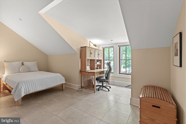 9 E Walnut St, Alexandria, VA 22301 - bedroom with light tile patterned floors, an office area, and lofted ceiling
