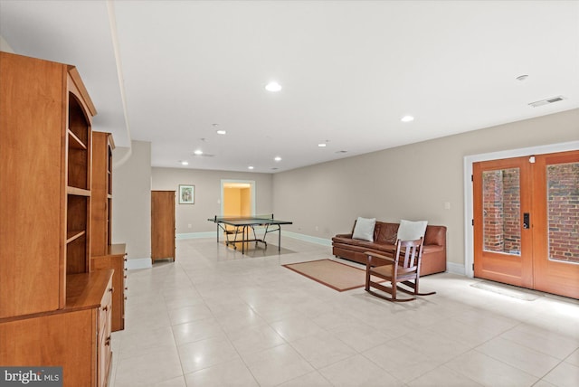 9 E Walnut St, Alexandria, VA 22301 - sitting room with french doors, recessed lighting, and light tile patterned flooring