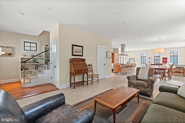 9 E Walnut St, Alexandria, VA 22301 - living room featuring light tile patterned flooring and stairway