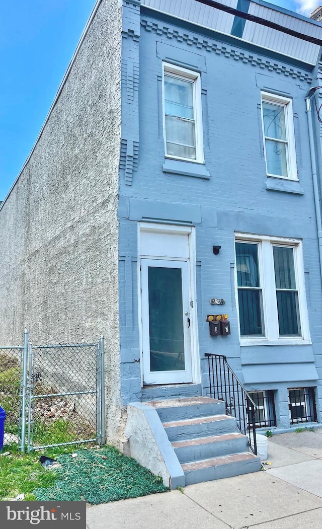 2538 N 16th St, Philadelphia, PA 19132 - townhome / multi-family property featuring a gate