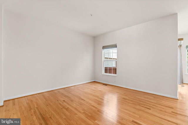 9956 Fragrant Lilies Way, Laurel, MD 20723 - spare room with light wood-style flooring and baseboards