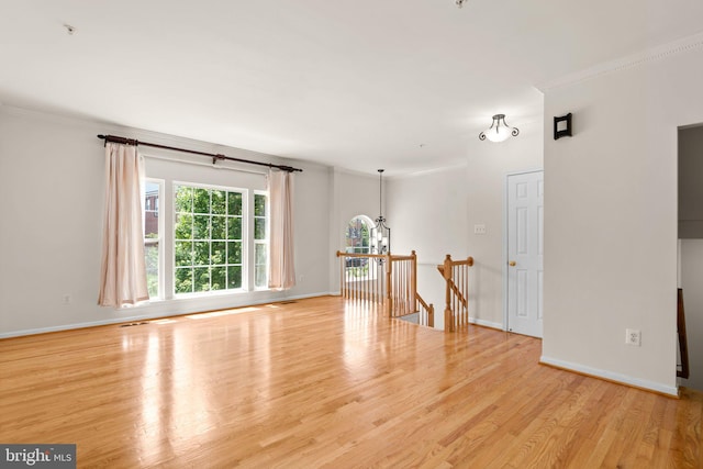 9956 Fragrant Lilies Way, Laurel, MD 20723 - unfurnished room with a chandelier, wood finished floors, and crown molding