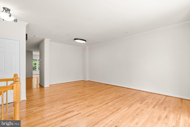 9956 Fragrant Lilies Way, Laurel, MD 20723 - spare room with light wood-style floors and ornamental molding