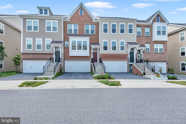 8321 Meadowood Dr, Hanover, MD 21076 - multi unit property featuring brick siding, driveway, and an attached garage