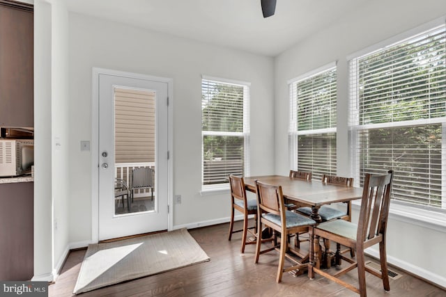 8321 Meadowood Dr, Hanover, MD 21076 - dining space with wood finished floors and ceiling fan
