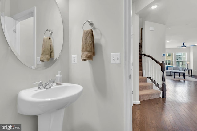 8321 Meadowood Dr, Hanover, MD 21076 - bathroom with hardwood / wood-style floors, ceiling fan, and recessed lighting