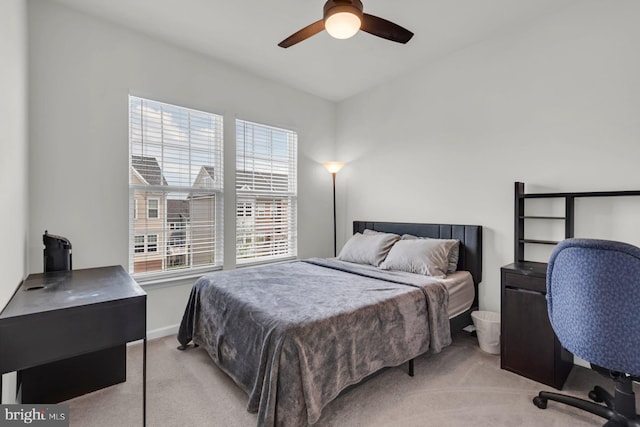 8321 Meadowood Dr, Hanover, MD 21076 - bedroom with light colored carpet, a desk, and ceiling fan