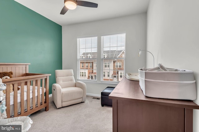 8321 Meadowood Dr, Hanover, MD 21076 - carpeted bedroom featuring a crib and ceiling fan