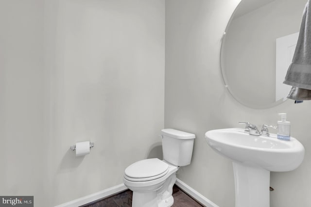 8321 Meadowood Dr, Hanover, MD 21076 - bathroom with baseboards and wood finished floors
