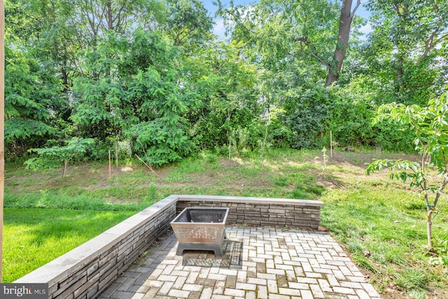 8321 Meadowood Dr, Hanover, MD 21076 - view of patio / terrace featuring an outdoor fire pit