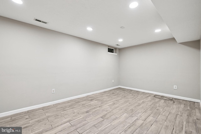 9228 Pinenut Ct, Laurel, MD 20723 - finished basement featuring light wood-style floors and recessed lighting