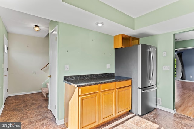 1142 Pheasant Dr N, Carlisle, PA 17013 - kitchen featuring freestanding refrigerator and dark countertops