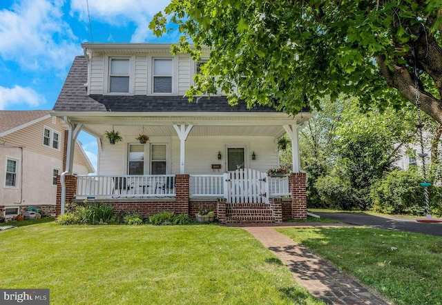 250 Maple Ave, Glenside, PA 19038 - bungalow featuring covered porch, a front lawn, and roof with shingles