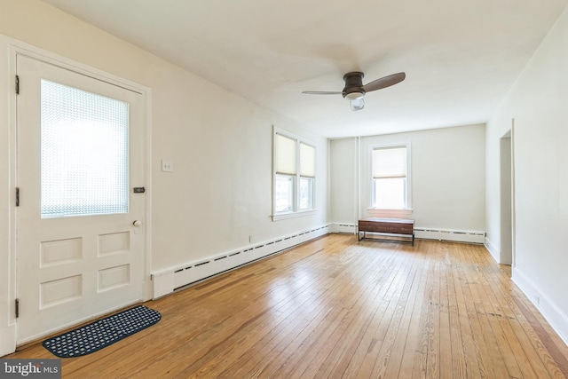 250 Maple Ave, Glenside, PA 19038 - foyer with baseboard heating, hardwood / wood-style flooring, and a ceiling fan