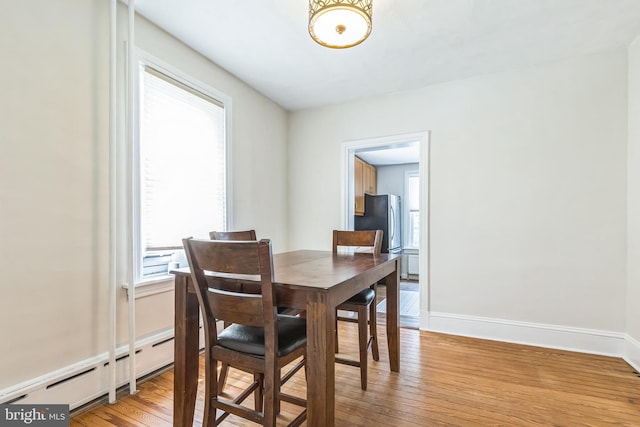 250 Maple Ave, Glenside, PA 19038 - dining area with a baseboard heating unit and light wood finished floors