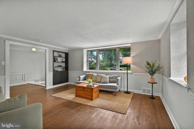 3 Arbor Lea Rd, Lansdowne, PA 19050 - living area with ornamental molding, wood finished floors, and built in shelves