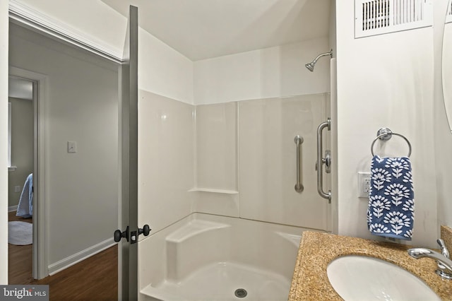 3 Arbor Lea Rd, Lansdowne, PA 19050 - full bathroom with a shower, wood finished floors, and vanity
