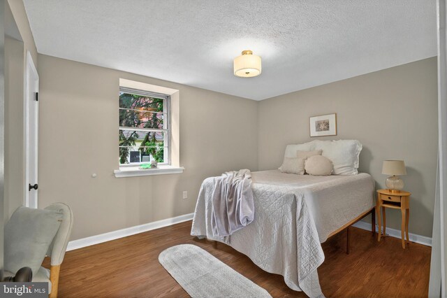 3 Arbor Lea Rd, Lansdowne, PA 19050 - bedroom featuring wood finished floors and a textured ceiling