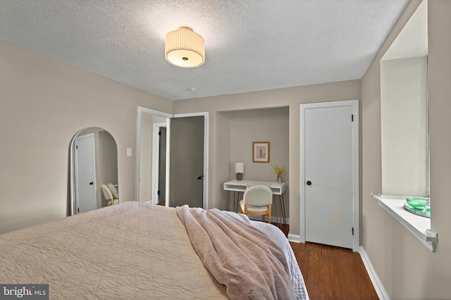 3 Arbor Lea Rd, Lansdowne, PA 19050 - bedroom with wood finished floors and a textured ceiling