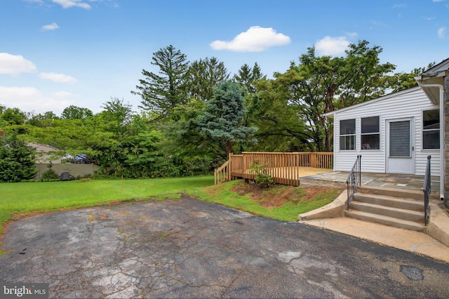 3 Arbor Lea Rd, Lansdowne, PA 19050 - view of green lawn with a deck