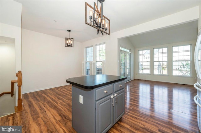 1724 Derrs Sq E, Frederick, MD 21701 - kitchen with gray cabinets, open floor plan, a chandelier, and dark countertops