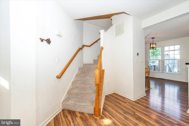 1724 Derrs Sq E, Frederick, MD 21701 - stairway with wood finished floors and a chandelier