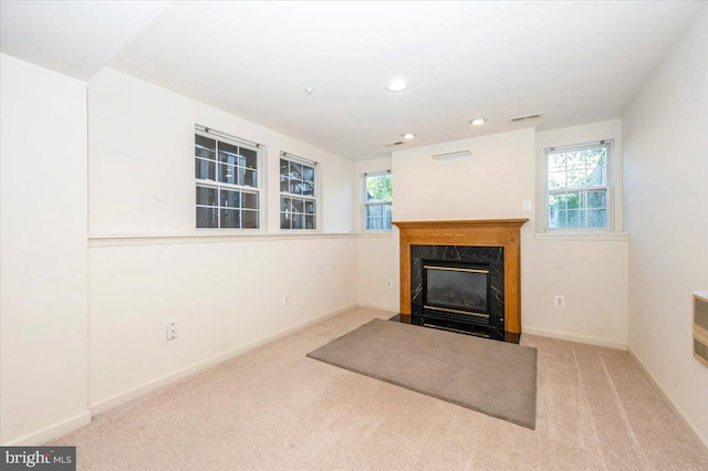 1724 Derrs Sq E, Frederick, MD 21701 - unfurnished living room featuring a high end fireplace, carpet flooring, plenty of natural light, and recessed lighting