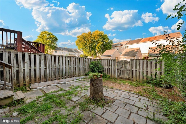 1724 Derrs Sq E, Frederick, MD 21701 - fenced backyard with a patio area and a residential view