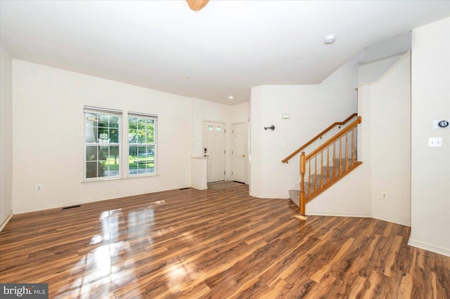 1724 Derrs Sq E, Frederick, MD 21701 - unfurnished living room with wood finished floors and stairs