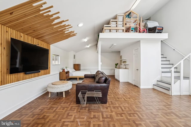 2307 Sherwood Hall Ln, Alexandria, VA 22306 - living room with lofted ceiling, stairs, and recessed lighting