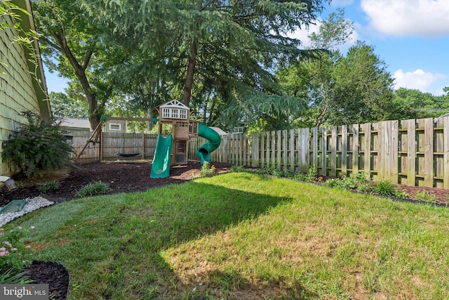 2307 Sherwood Hall Ln, Alexandria, VA 22306 - fenced backyard featuring a playground