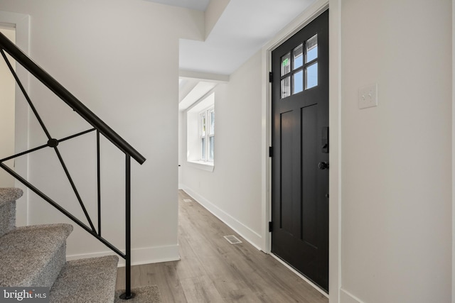 4 New Coach Ln, Willingboro, NJ 08046 - foyer entrance with stairway, light wood-style flooring, and plenty of natural light