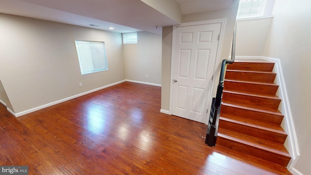 8117 Grayden Ln, Brandywine, MD 20613 - basement with wood finished floors, stairway, and recessed lighting