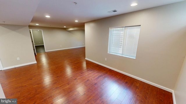 8117 Grayden Ln, Brandywine, MD 20613 - spare room featuring wood finished floors, recessed lighting, and fire sprinkler in ceiling