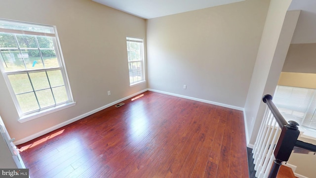 8117 Grayden Ln, Brandywine, MD 20613 - empty room featuring plenty of natural light and wood finished floors