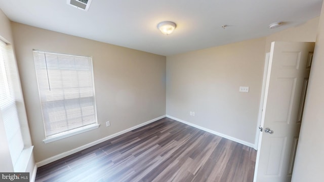 8117 Grayden Ln, Brandywine, MD 20613 - empty room featuring a smoke detector, dark wood finished floors, healthy amount of natural light, and fire sprinkler in ceiling