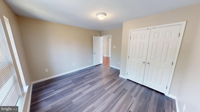 8117 Grayden Ln, Brandywine, MD 20613 - unfurnished bedroom featuring dark wood-style floors and a closet