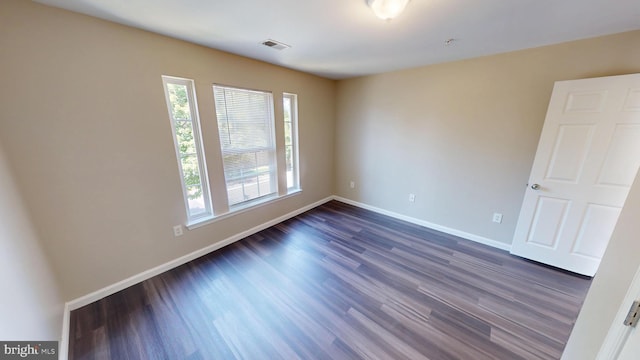 8117 Grayden Ln, Brandywine, MD 20613 - unfurnished room featuring healthy amount of natural light, dark wood-type flooring, and fire sprinkler in ceiling