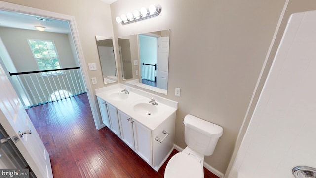 8117 Grayden Ln, Brandywine, MD 20613 - bathroom featuring wood finished floors and double vanity