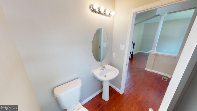 8117 Grayden Ln, Brandywine, MD 20613 - half bath with wood finished floors and decorative columns